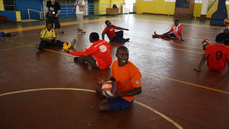 Athletes learn Sitting Volleyball skills on Day 2 of the Agitos Foundation Youth Workshop athletes practicing sitting volleyball