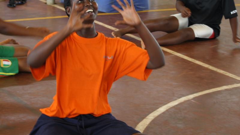 Delegations ensured that they balanced male and female participation female athlete pracicing volleyball