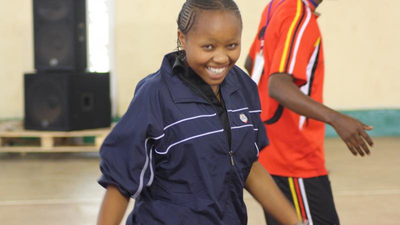Play and Train held a workshop on Day 2 about the power of sport for personal development girl smiling