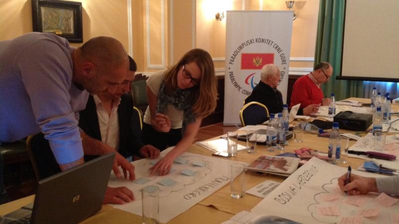 Balkans workshop A picture of a people talking around a table