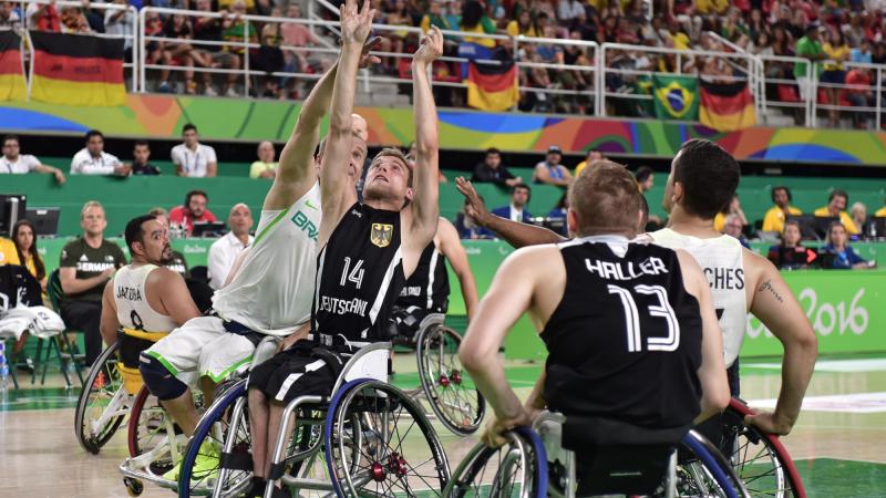 Thomas Boehme - Germany - wheelchair basketball male wheelchair basketballer Thomas Boehme challenging for the ball