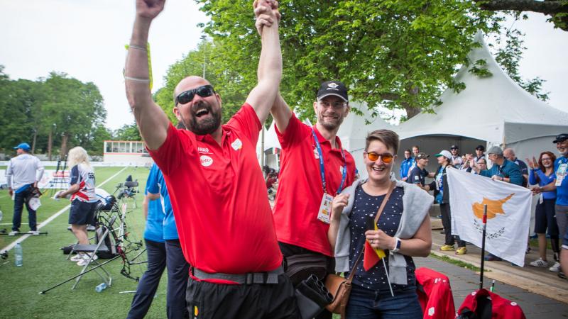 Ruben Vanhollebeke - Belgium - archery Vision impaired male archer celebrates with his coach hugging him